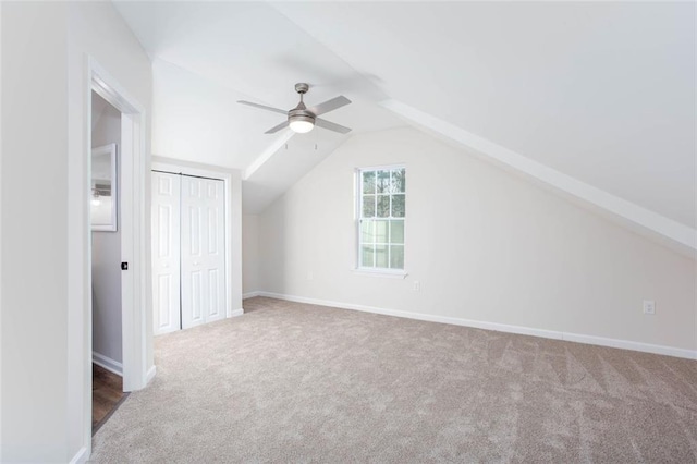 bonus room featuring carpet, ceiling fan, and vaulted ceiling