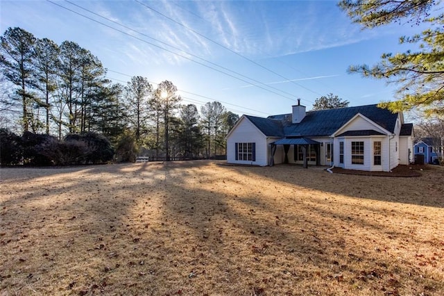 exterior space with a front yard