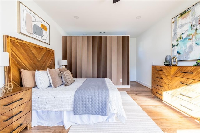 bedroom with light hardwood / wood-style flooring