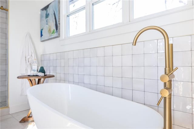 bathroom with a tub