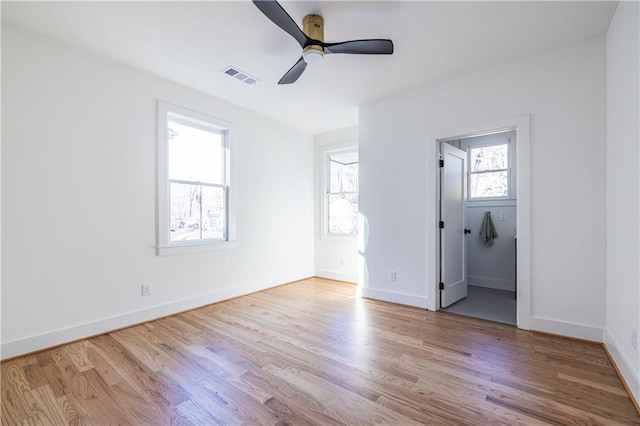 unfurnished bedroom with ceiling fan and light hardwood / wood-style flooring