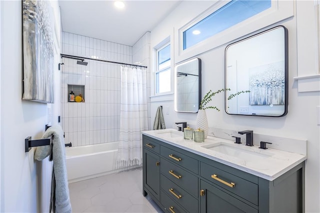 bathroom with tile patterned floors, vanity, and shower / tub combo