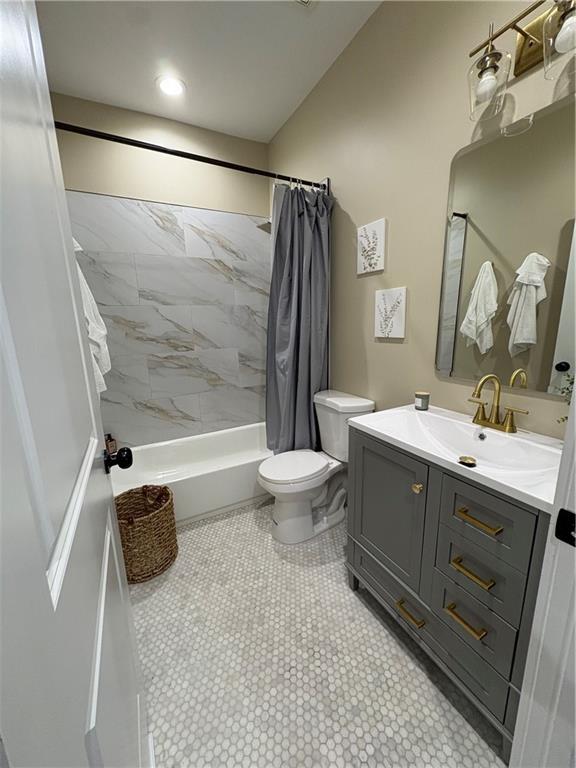 2148 Martin Luther King Jr Dr SW, Atlanta, GA 30310 - bathroom with vanity, shower / bath combo with shower curtain, and recessed lighting