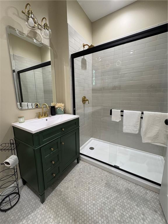 2148 Martin Luther King Jr Dr SW, Atlanta, GA 30310 - bathroom with vanity and a stall shower