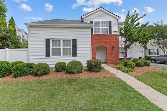 view of front of home featuring brick siding