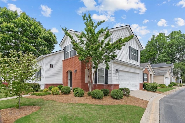 view of front of home with brick siding, an attached garage, driveway, and a front yard