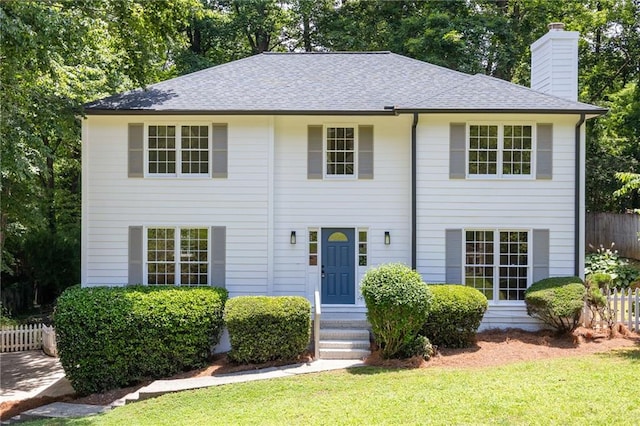 1172 Colony Dr, Marietta, GA 30068 - view of front facade with a chimney and a shingled roof