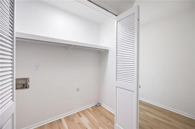 1172 Colony Dr, Marietta, GA 30068 - laundry room with light wood-style flooring and baseboards