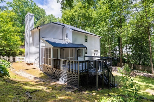 1172 Colony Dr, Marietta, GA 30068 - back of house with a chimney, a sunroom, a wooden deck, stairs, and a shingled roof