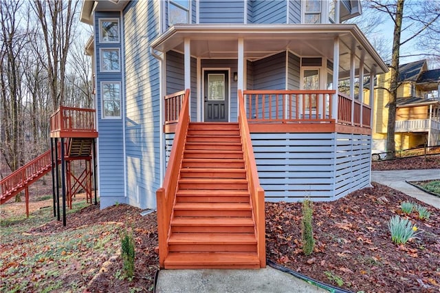 property entrance featuring covered porch