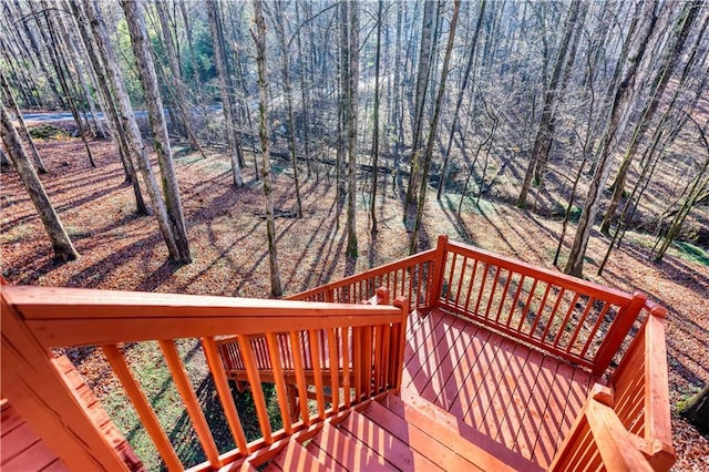 deck with a wooded view