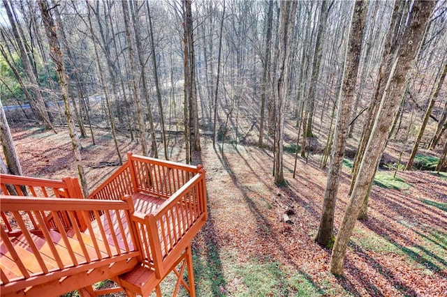 view of yard with a view of trees