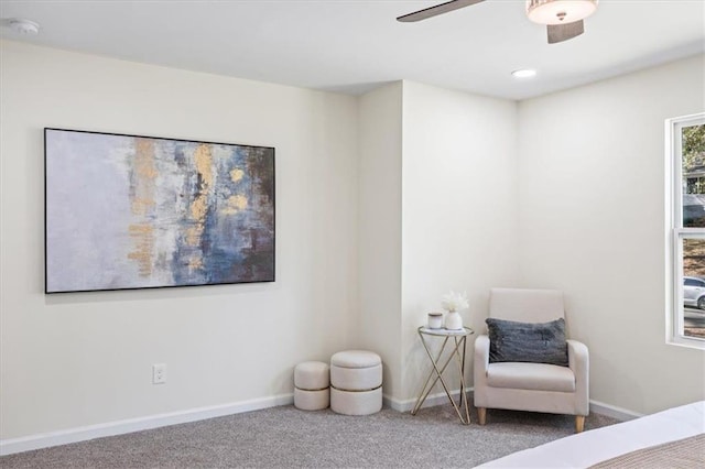 bedroom with ceiling fan, carpet, and baseboards