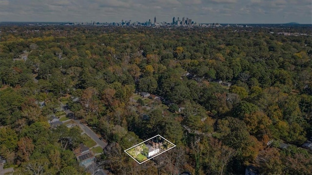 aerial view with a wooded view