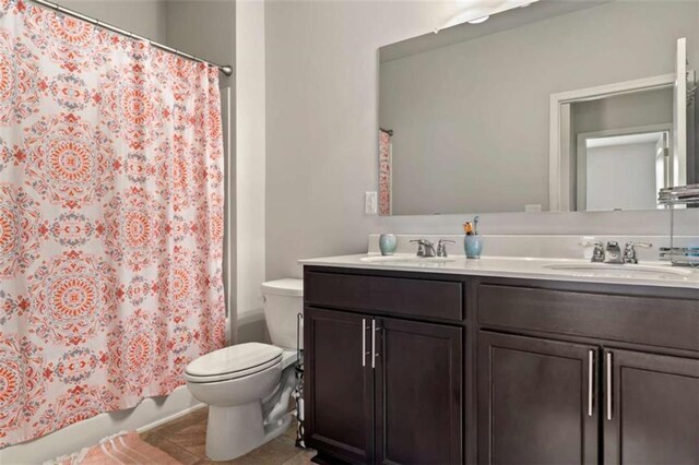 736 Red Wolf Run, Atlanta, GA 30349 - full bath featuring double vanity, toilet, shower / bathtub combination with curtain, and a sink