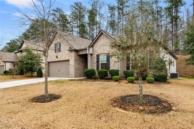 736 Red Wolf Run, Atlanta, GA 30349 - view of front of house featuring brick siding, concrete driveway, and a front lawn