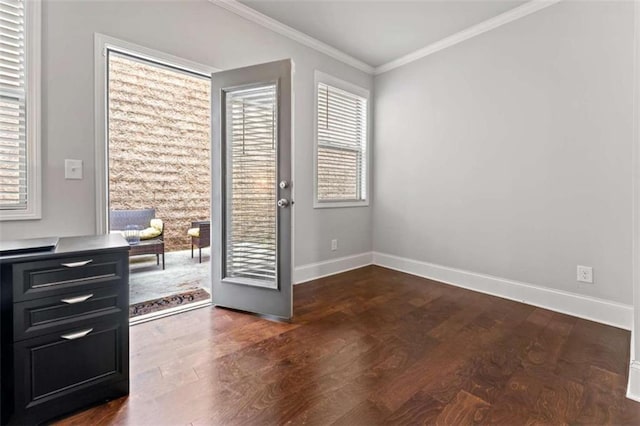 736 Red Wolf Run, Atlanta, GA 30349 - entryway with baseboards, dark wood-type flooring, and ornamental molding
