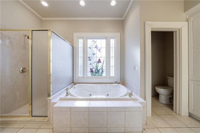 bathroom featuring tile patterned flooring, toilet, and ornamental molding