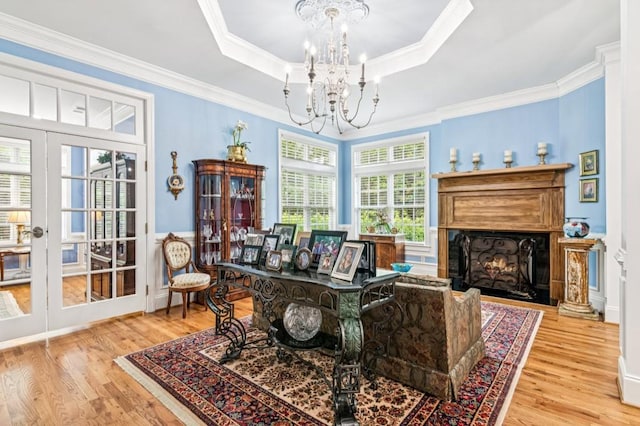 317 Red Gate Overlook, Canton, GA 30115 - office space featuring a chandelier, wood finished floors, a lit fireplace, crown molding, and a raised ceiling