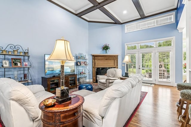 317 Red Gate Overlook, Canton, GA 30115 - living room with beamed ceiling, a fireplace, wood finished floors, coffered ceiling, and french doors