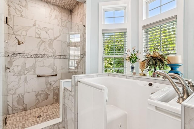 317 Red Gate Overlook, Canton, GA 30115 - bathroom featuring a tile shower and a jetted tub