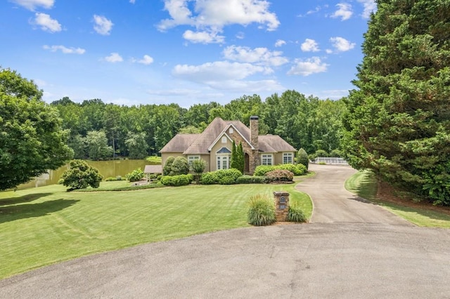 317 Red Gate Overlook, Canton, GA 30115 - view of front of house with a chimney and stucco siding