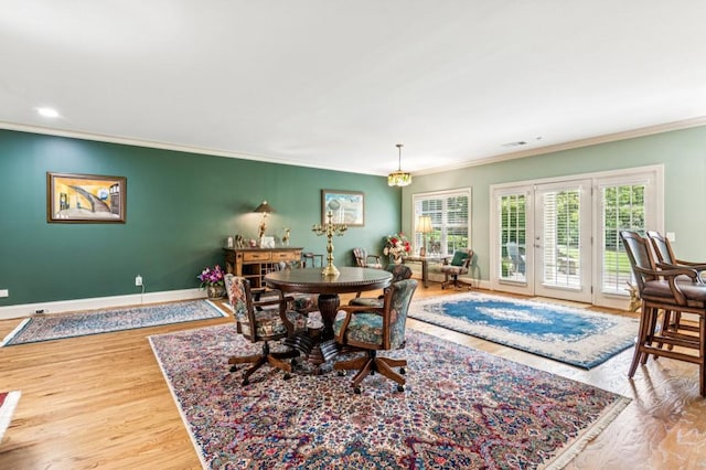 317 Red Gate Overlook, Canton, GA 30115 - dining room with crown molding, wood finished floors, and recessed lighting