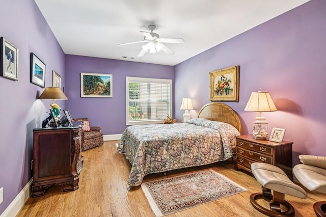 317 Red Gate Overlook, Canton, GA 30115 - bedroom with wood finished floors and a ceiling fan