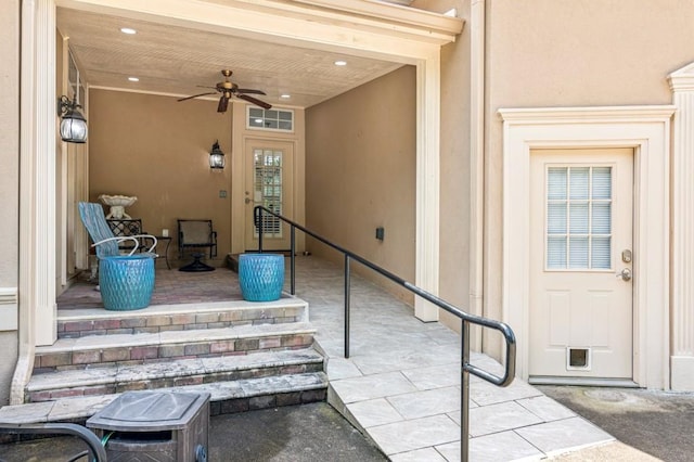 317 Red Gate Overlook, Canton, GA 30115 - property entrance featuring ceiling fan and stucco siding