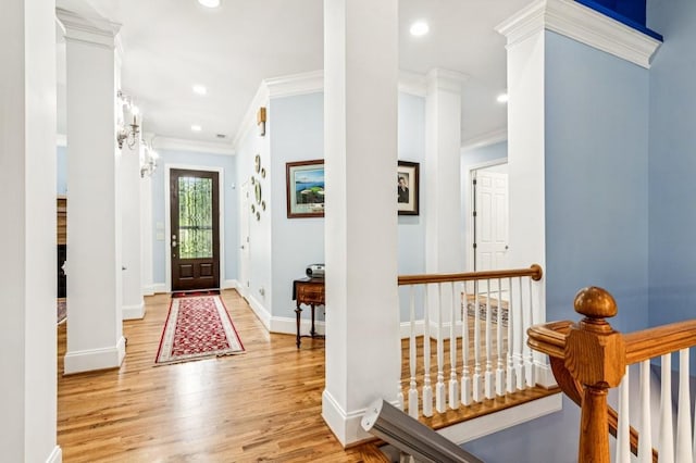 317 Red Gate Overlook, Canton, GA 30115 - entryway featuring light wood finished floors, ornamental molding, and recessed lighting