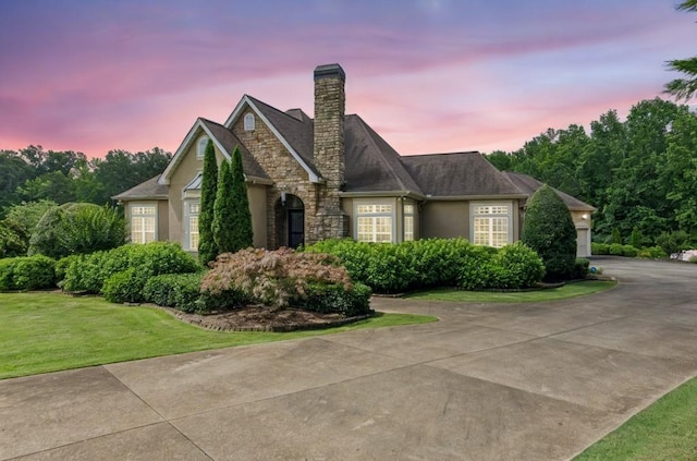 317 Red Gate Overlook, Canton, GA 30115 - view of front of property with a yard, a chimney, and stucco siding