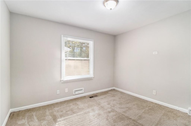 2435 Wood Valley Dr, Atlanta, GA 30344 - carpeted empty room with baseboards