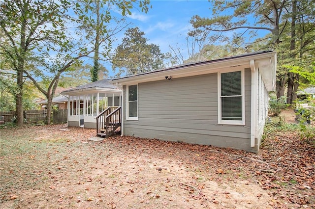 2435 Wood Valley Dr, Atlanta, GA 30344 - back of house with a sunroom