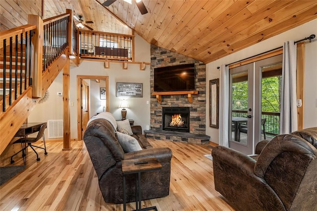 68 Whispering Hawk Ct, Morganton, GA 30560 - living room with ceiling fan, wood-type flooring, wood ceiling, a stone fireplace, and high vaulted ceiling