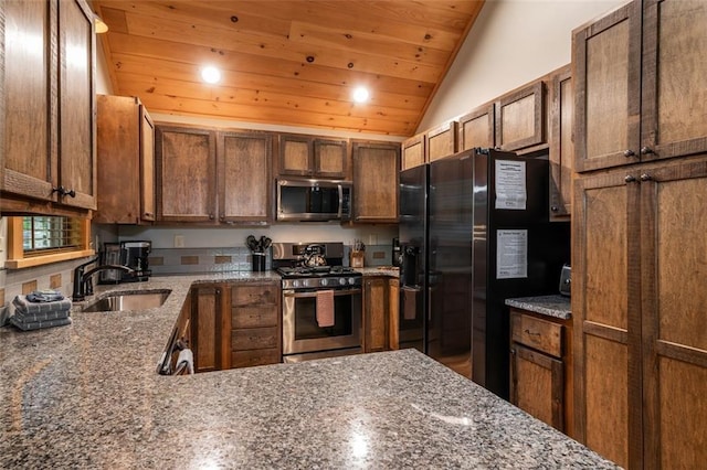68 Whispering Hawk Ct, Morganton, GA 30560 - kitchen featuring appliances with stainless steel finishes, wood ceiling, lofted ceiling, stone countertops, and recessed lighting