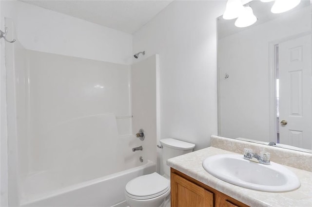 full bathroom with vanity,  shower combination, and toilet