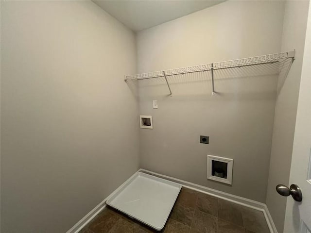 laundry room featuring laundry area, baseboards, washer hookup, and electric dryer hookup