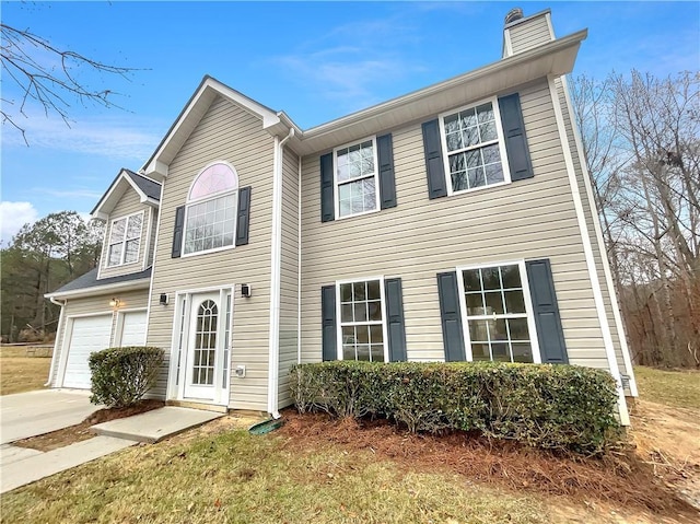 view of front of home with a garage