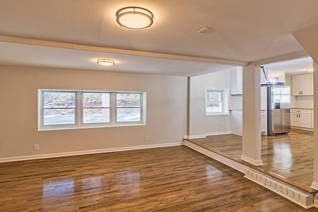 interior space with dark hardwood / wood-style flooring