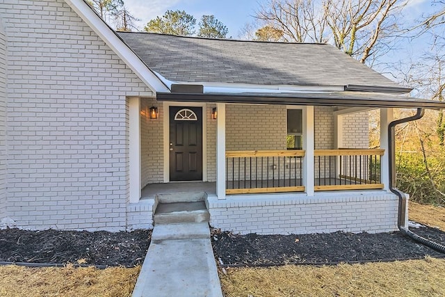 doorway to property with a porch