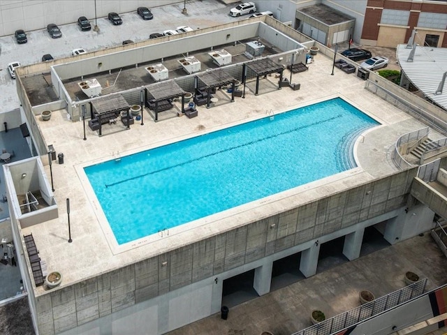 pool featuring a patio area