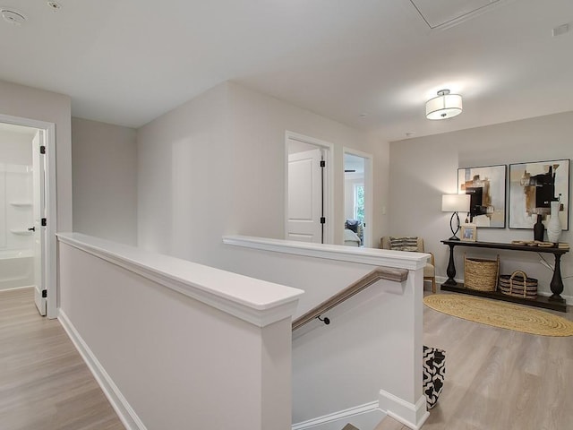 hall featuring light hardwood / wood-style floors