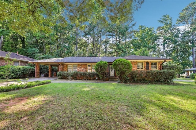 single story home featuring a carport and a front yard