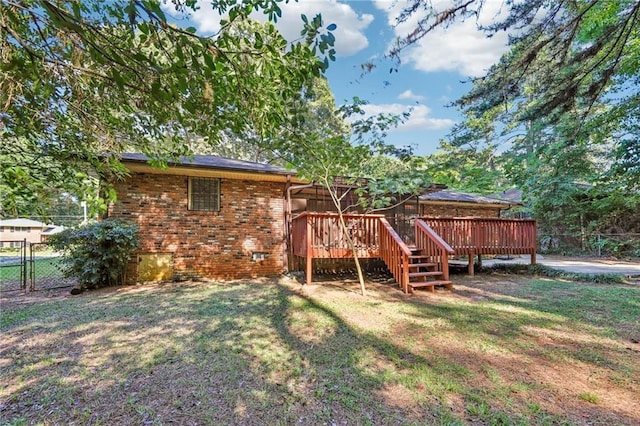 view of yard with a deck