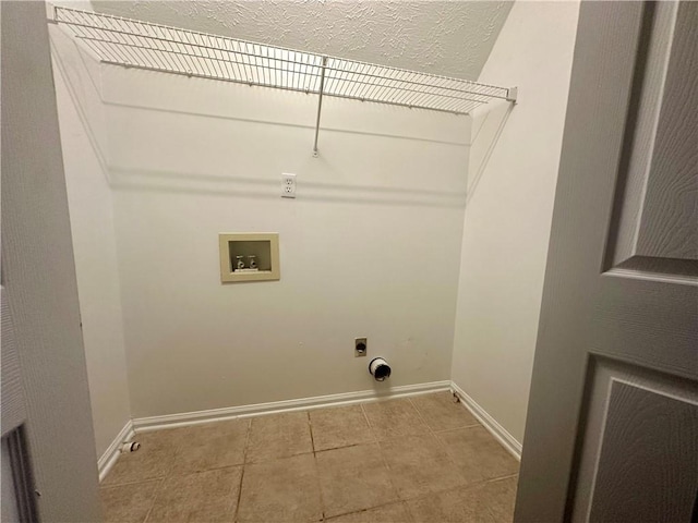 laundry room featuring hookup for a washing machine, tile patterned flooring, and hookup for an electric dryer