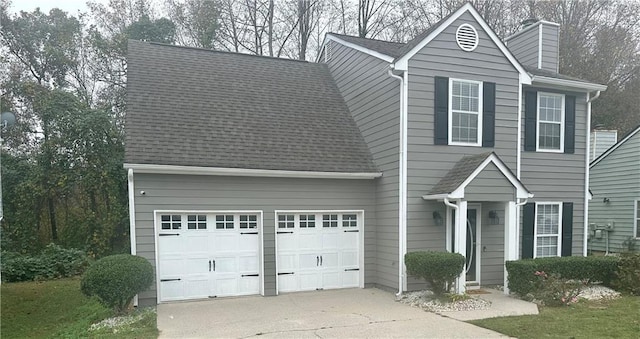 view of front of home with a garage