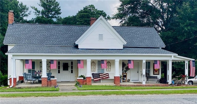 view of front of property featuring covered porch