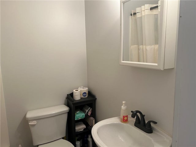 216 Hardee St, Dallas, GA 30132 - full bath with a sink, toilet, and a shower with curtain