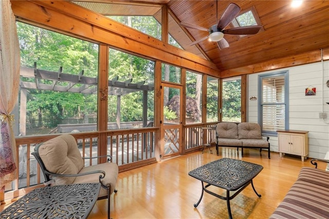 sunroom / solarium with an outdoor living space and ceiling fan
