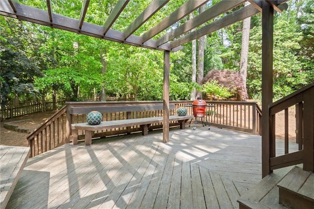 wooden deck with fence and a pergola